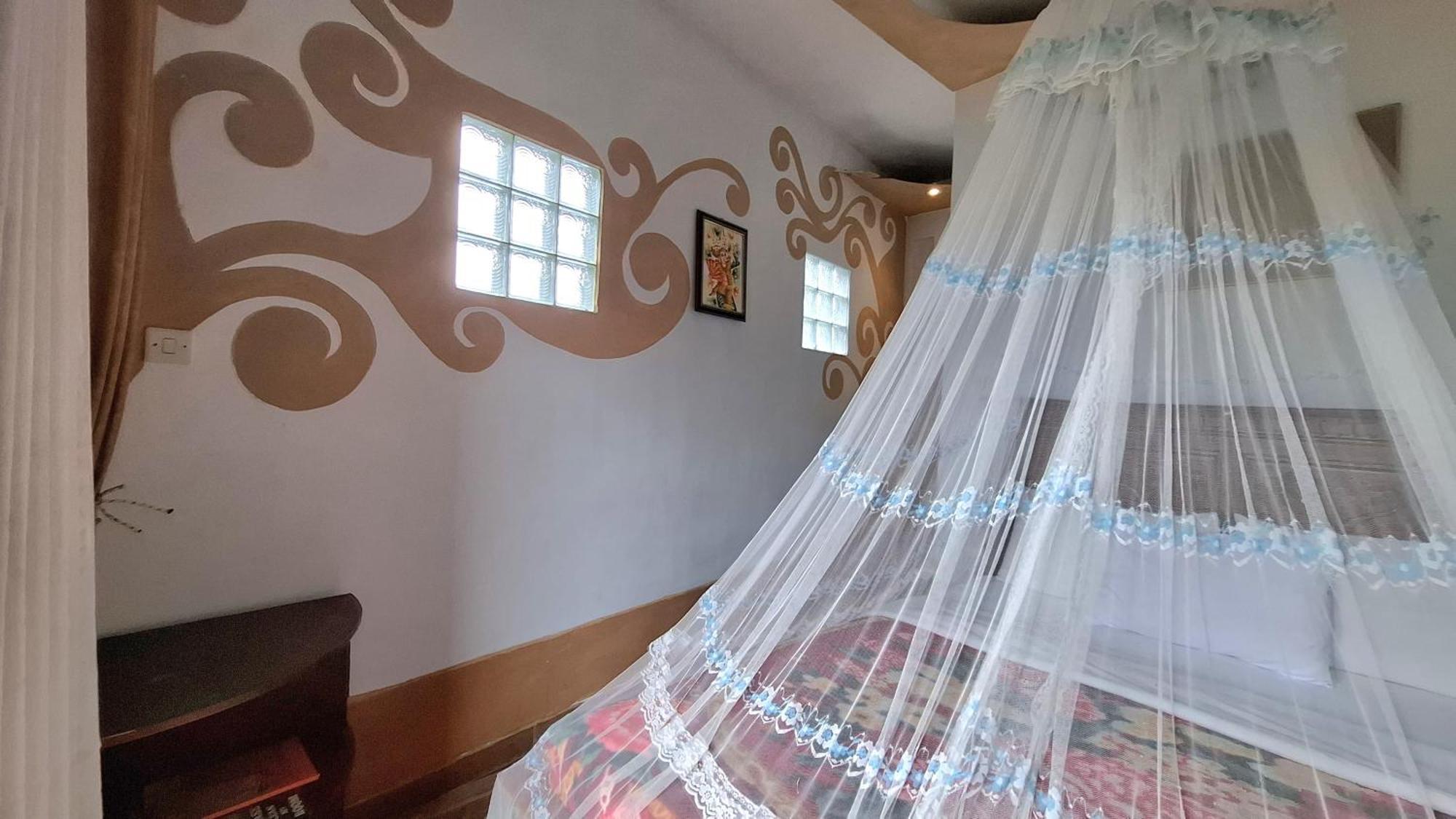 Umah De Madya & Rooftop De Madya มุนดุก ภายนอก รูปภาพ