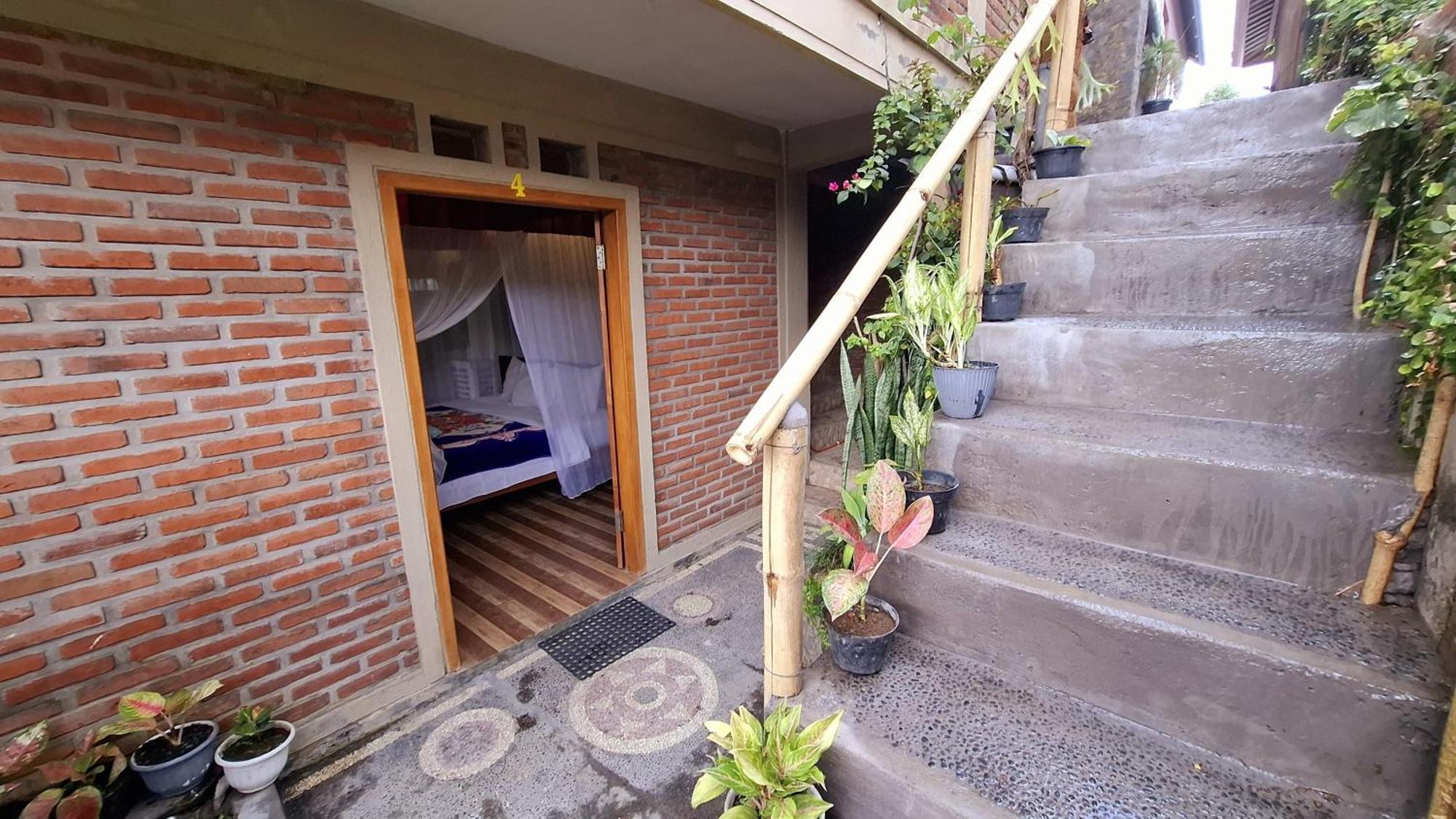 Umah De Madya & Rooftop De Madya มุนดุก ภายนอก รูปภาพ